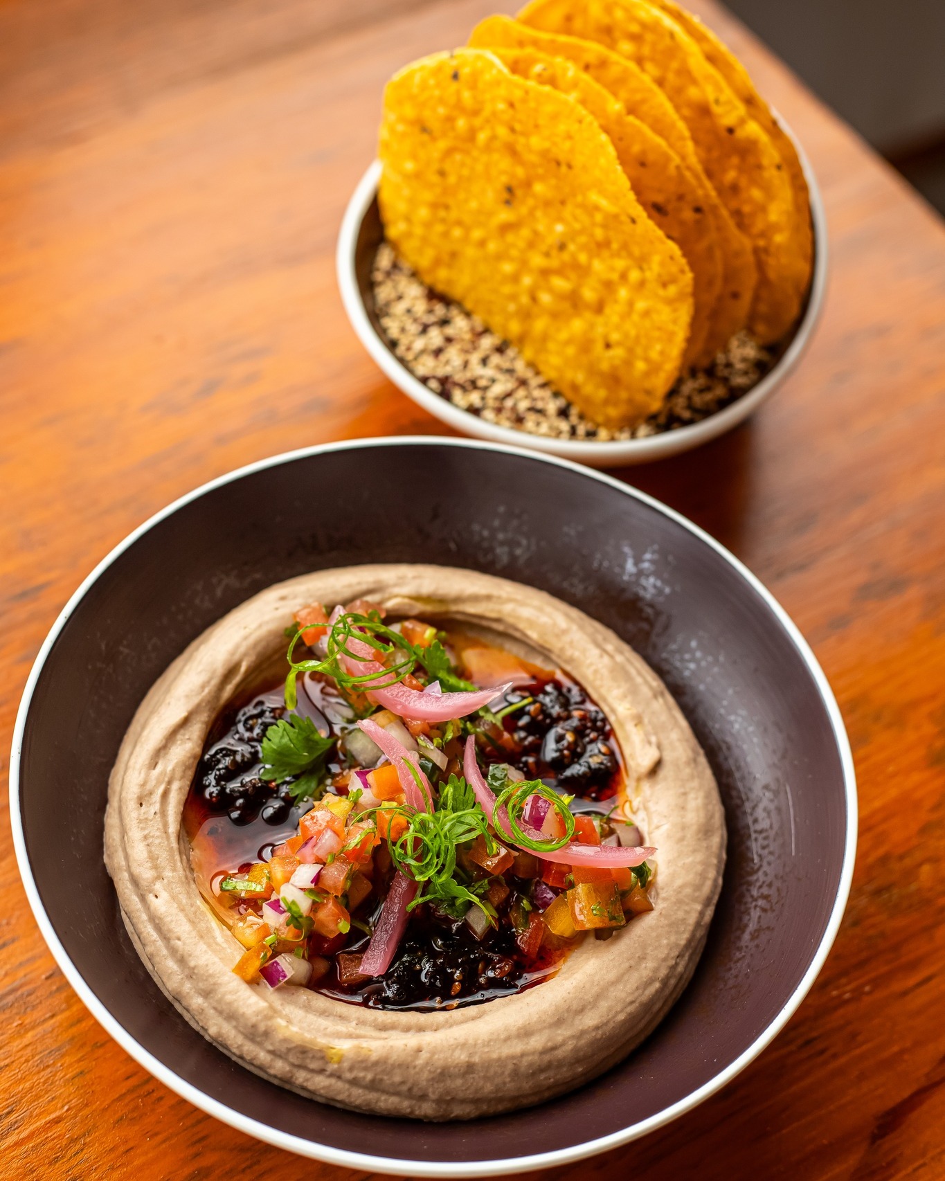 A vegan and gluten-free option with real flavor. 🌱

Our Pinto Beans Hummus is made with pinto beans, chickpeas, tahini, lemon, and spices, topped with salsa macha and pico de gallo.

Served with crispy corn tostadas, it’s a great pick if you’re having cocktails and want something light but satisfying.

🛥 Boat ride available from @arunaresortandvillas Dock
📲 Reserve your spot | Link in bio | +501 612-0144
.
.
.
#VeganBelize #GlutenFreeBelize #CocktailBites #AkashaBelize