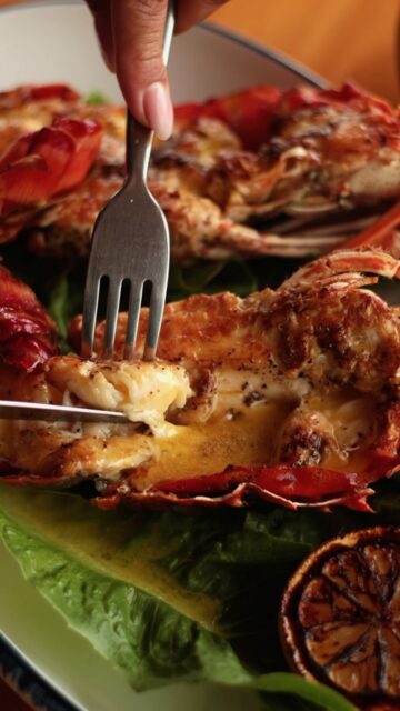The one you came for. Whole Caribbean spiny lobster, straight off the grill.

Split, brushed, and cooked over open flame until the shell chars and the meat turns sweet, smoky and tender. No sauces to hide behind, no shortcuts, just fire and the freshest catch of the day.

This is the dish the whole season is built around.

📲 Reserve your table for October | Link in bio | +501 612-0144
.
.
.
#WholeLobster #GrilledLobster #LobsterSeasonBelize